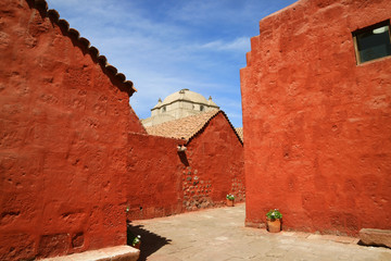 Vivid orange red colored of nun’s living quarter in Santa Catalina Monastery, UNESCO world heritage site in Arequipa, Peru, South America