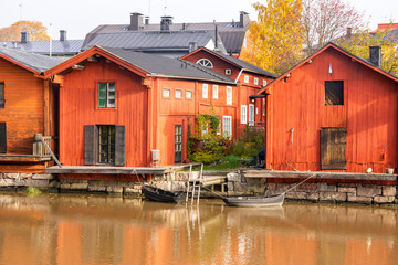 Obraz premium Porvoo city and Porvoonjoki river view, old wooden houses and boats, Finland