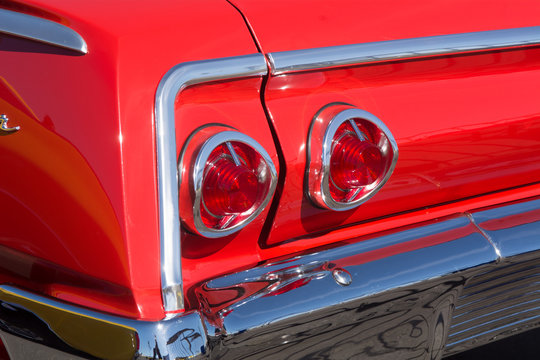 tail lights on red classic car. Car part art is specifically cropped to create interesting designs from classic American cars 04/06/2019