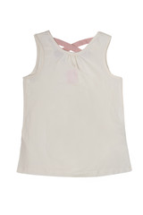 Sleeveless shirt isolated. Beige child girl shirt or t-shirt with pink ribbons on the back isolated on a white background. Kids fashion.