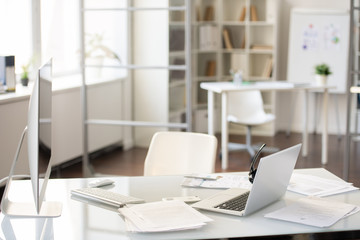 Office desk with two computers