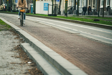 A woman ride a bicycle