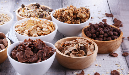 Bowls with different sorts of breakfast cereal products