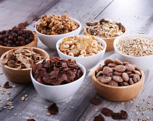 Bowls with different sorts of breakfast cereal products