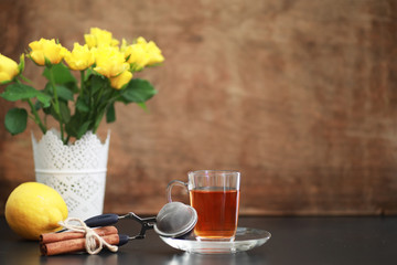 A cup with tea on the table