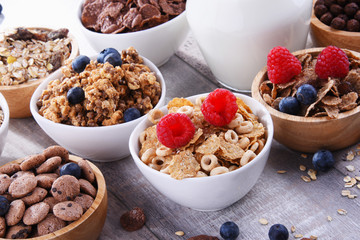 Bowls with different sorts of breakfast cereal products