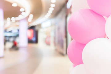 White and Pink Balloons on Defocused Background