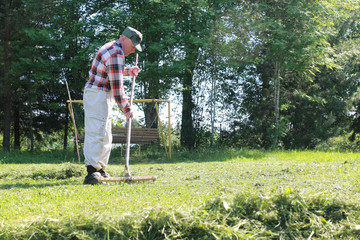 Cleaning with a rake on a farm
