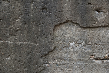 Gray Concrete background with partly breakaway layer.