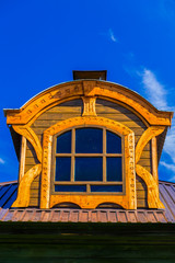 Framed window on the tile roof