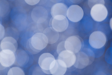Abstract background. White and blue circles in bokeh