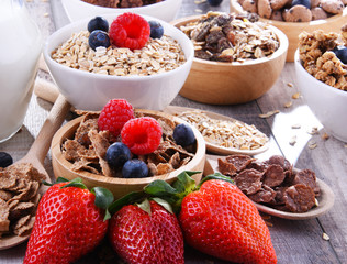 Bowls with different sorts of breakfast cereal products