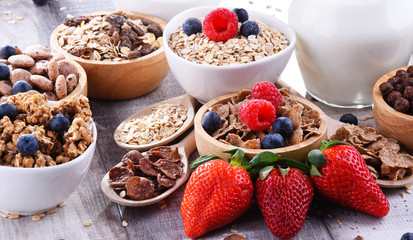Bowls with different sorts of breakfast cereal products