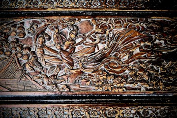 beautiful pattern carved on an old wooden chest