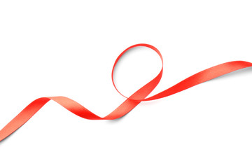 Simple red ribbon on white background, top view. Festive decoration