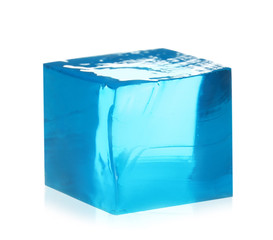 Delicious blue jelly cube on white background