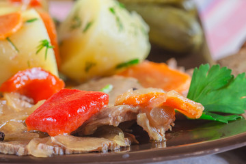 Beef stew in a plate , top view, close up