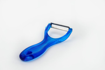 Vegetable and fruit peeler on white background