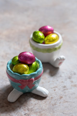 Chocolate eggs in colorful foil for easter