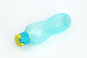 Blue plastic water bottle on a white background