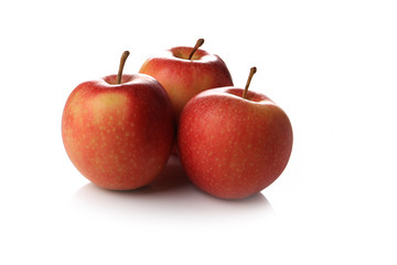 three red apples isolated on white background