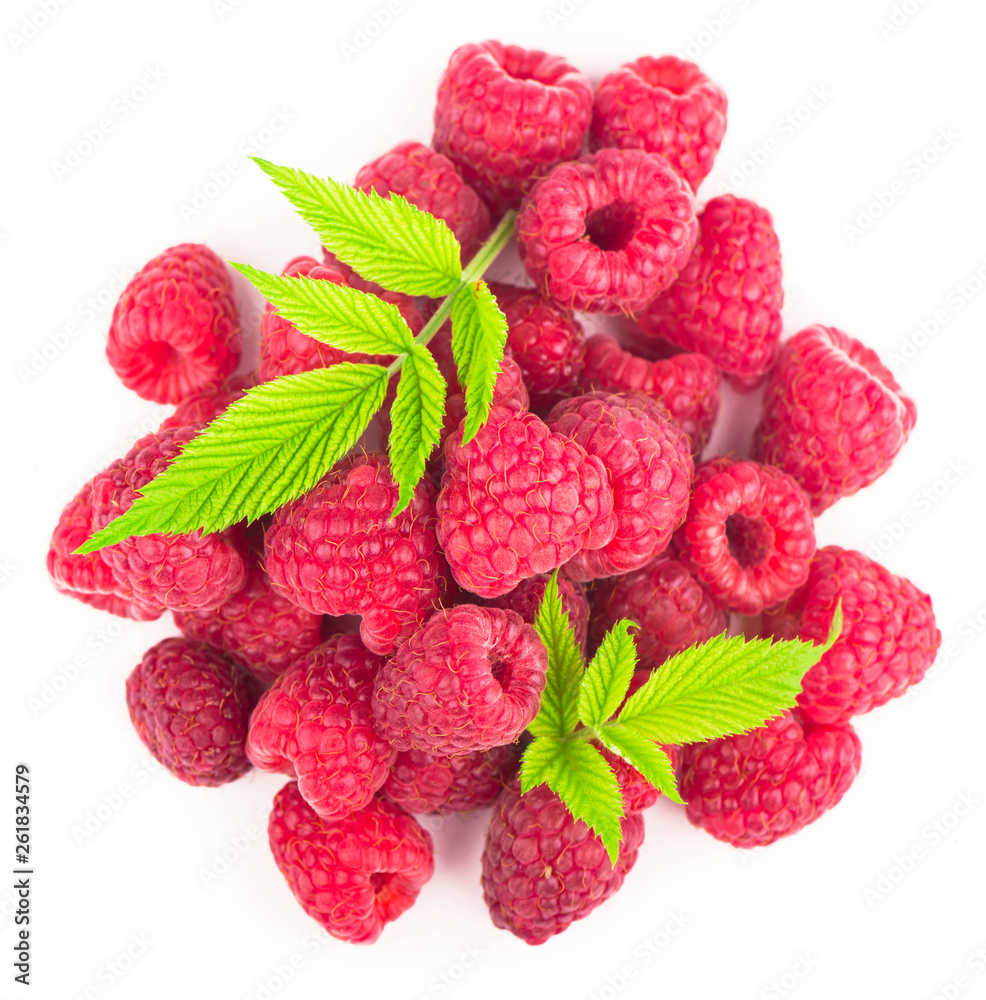 Wall mural Raspberry with leaves isolated on white background