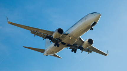 Fototapeta na wymiar Passenger plane departing in afternoon