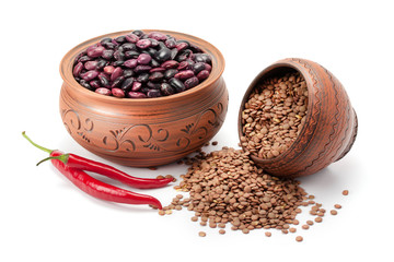 Clay pots legumes and chili peppers.