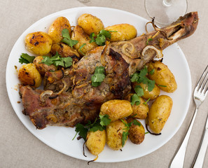 Grilled shoulder of mutton with baked new potatoes