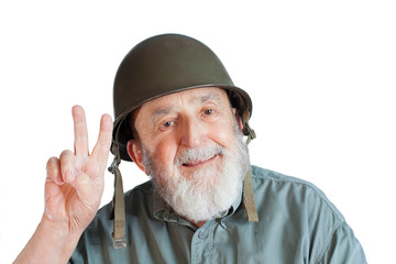 senior soldier veteran showing victory sign isolated on white background