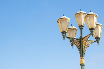 Fototapeta na wymiar Old street lamp with metal degradation