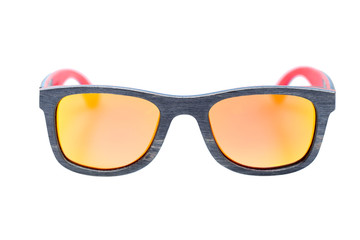 70s style square sunglasses in wood with a gray texture and glasses of yellow orange chameleon colors isolated on a white background front view.