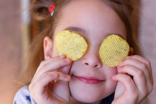  Little Girl Eating Chips