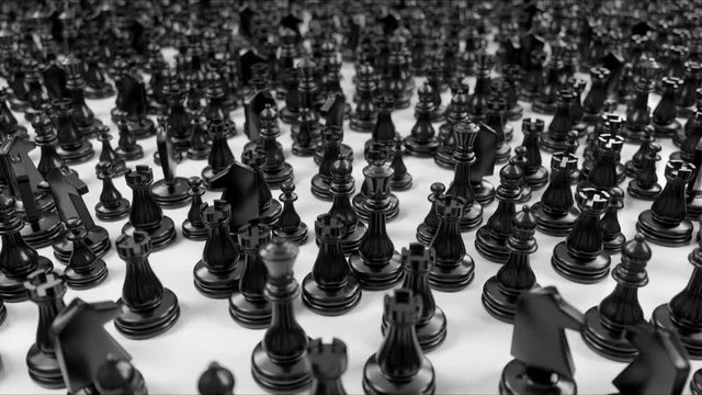 camera moves over the crowd of different black chess pieces and focuses on the white king