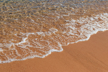 Soft wave of sea on sandy beach