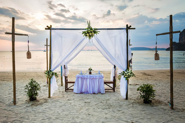 Romantic dinner table on the beach