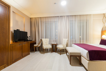 Interior of a hotel bedroom in the evening
