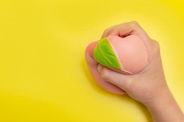 squishy toy in children's hands