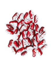 Pile of ripe speckled kidney Anasazi beans, with vivid burgundy color isolated on white background....