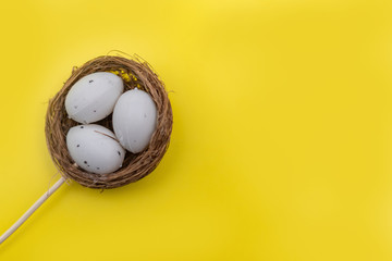 Easter eggs on yellow background