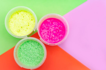 colorful slimes on colorful background