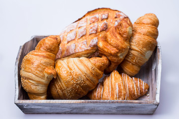 fresh croissants on a plate