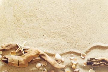 Fototapeta na wymiar Starfish and seashells on sand. Sea summer vacation background with space for the text