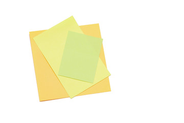 Multi-colored paper notes on a white background.