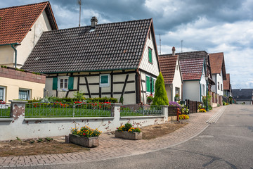 Traditional half-timbered houses in the streets of the small town of Seebach in Alsace