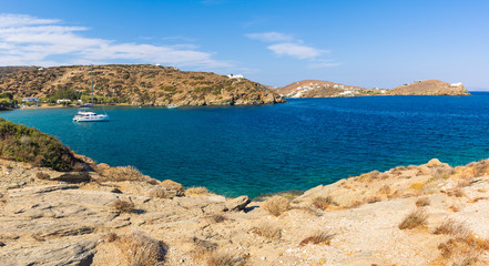 Fototapeta na wymiar Chrysopigi bay with the main beach of Apocofto with amazing turquoise waters. Sifnos island, Cyclades, Greece