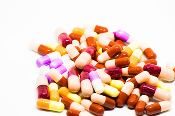 Medicines of various colors in the form of tablets, capsules and gelatin
