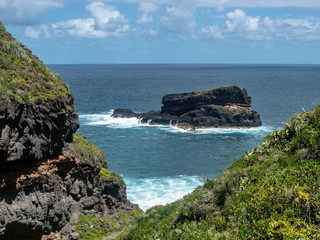 great view from the hill to the rock in the sea