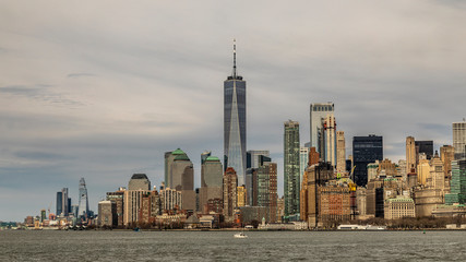 Fototapeta na wymiar Skyline of Manhattan in NYC USA seen from a ferry 