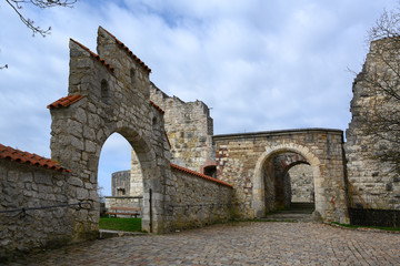 Fototapeta na wymiar arches in the castle ruin Hellenstein on the hill of Heidenheim an der Brenz in southern Germany against a blue sky with clouds, copy space
